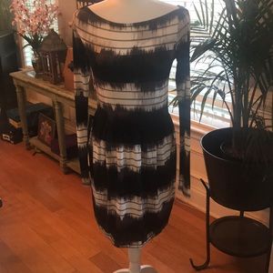 Rachel Roy long sleeve dress with pockets.
